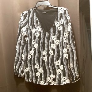 Sheer black and white blouse with an under slip